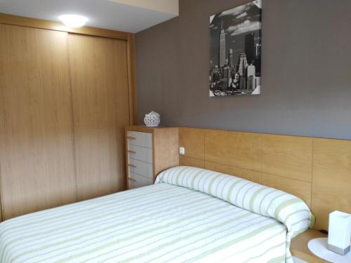 Säng eller sängar i ett rum på Apartamento turistico Olite