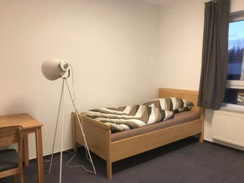 Postel nebo postele na pokoji v ubytování Am Bahnhof