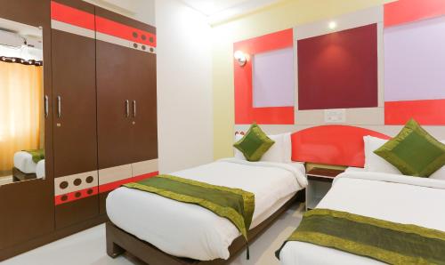 Postel nebo postele na pokoji v ubytování Itsy Hotels Worldtree Bellandur