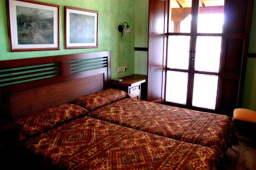 
Cama o camas de una habitación en Hotel Rural El Verdenal
