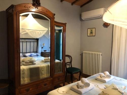 Cama o camas de una habitación en Agriturismo Podere Marchiano