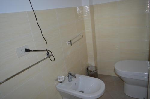 Kylpyhuone majoituspaikassa Appartamenti Sole delle Aci