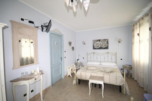 Katil atau katil-katil dalam bilik di La cicala stonata