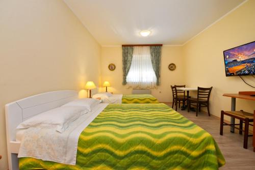 Postel nebo postele na pokoji v ubytování Bed and breakfast Julia