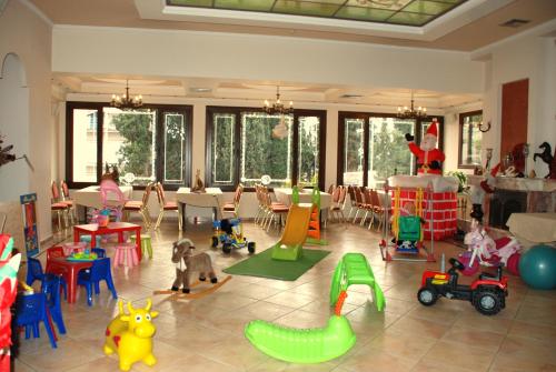 a room filled with lots of different kinds of toys at Hotel Pella in Giannitsa