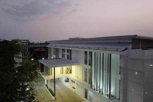 a view of a building with a roof at At Sakon Hotel in Sakon Nakhon