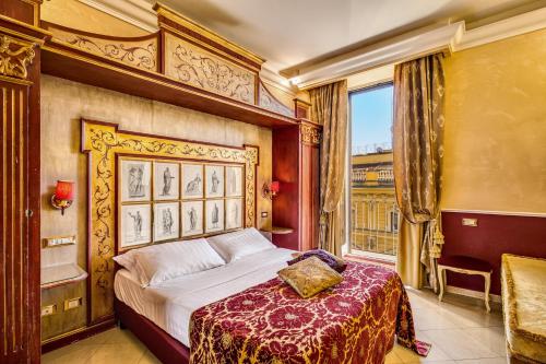 Postel nebo postele na pokoji v ubytování Romanico Palace Luxury Hotel & SPA
