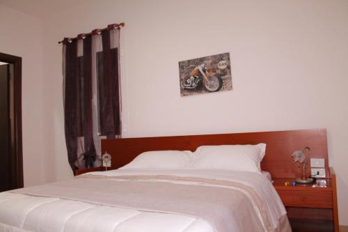 Postel nebo postele na pokoji v ubytování B&B Colle Tiziano