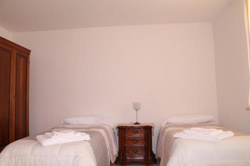 Postel nebo postele na pokoji v ubytování B&B Colle Tiziano