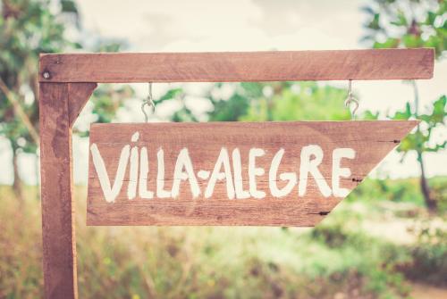 a wooden sign with the word malahide at Refugios Parajuru - Villa Alegre in Parajuru
