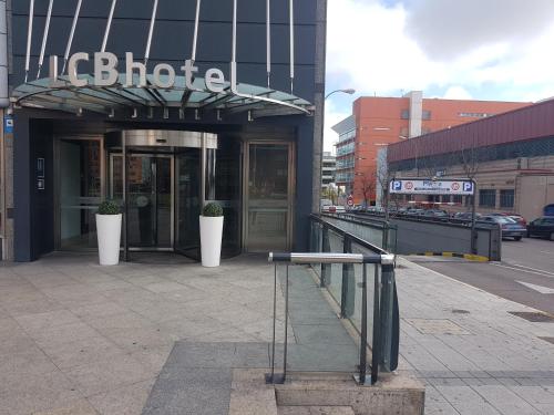 a building with a sign on the side of it at LCB Hotel Fuenlabrada in Fuenlabrada
