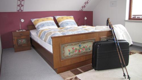 Ein Bett oder Betten in einem Zimmer der Unterkunft Ferienhaus Marienweg