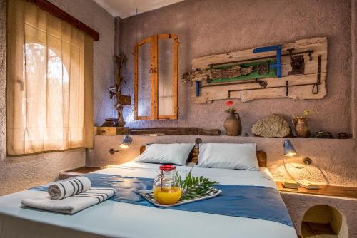 Кровать или кровати в номере Villa Kalliopi