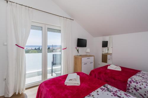 Posteľ alebo postele v izbe v ubytovaní Villa Toni with 5 bedrooms and heated pool