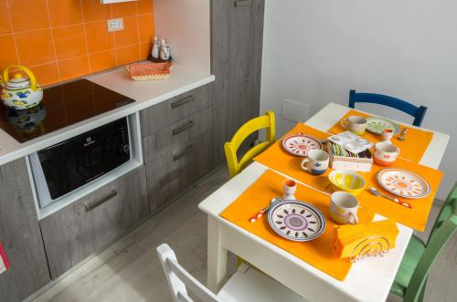 Η κουζίνα ή μικρή κουζίνα στο La Tintoria Suites