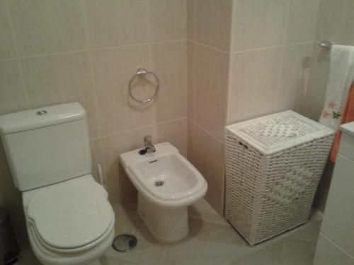 Ένα μπάνιο στο Apartamento Praia da Falésia