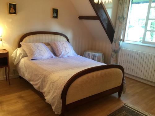 מיטה או מיטות בחדר ב-Villa Lucie