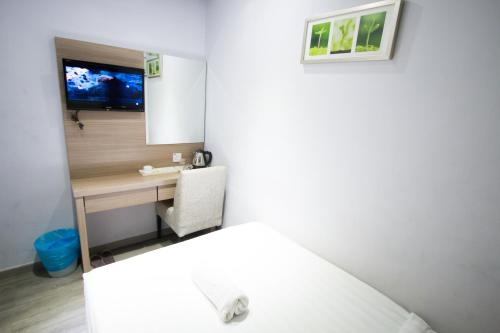 Postelja oz. postelje v sobi nastanitve Hotel 99 Pusat Bandar Puchong