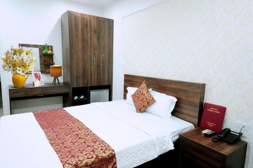 Un ou plusieurs lits dans un hébergement de l'établissement Van Giang Hotel