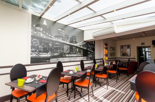 Posezení v ubytování Hotel La Roseraie
