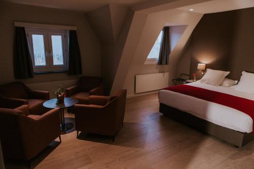 Hotel New Reginaにあるベッド
