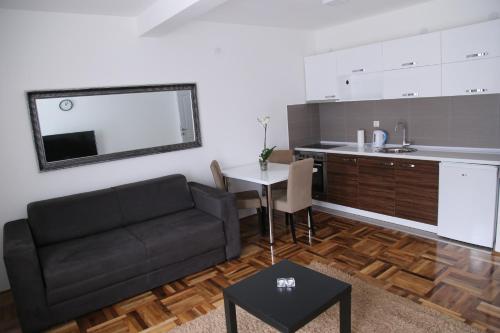 Η κουζίνα ή μικρή κουζίνα στο SAPA Studios & Apartments
