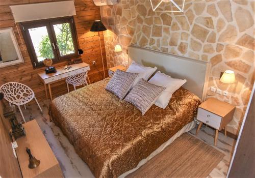 Un pat sau paturi într-o cameră la Villa Rodea