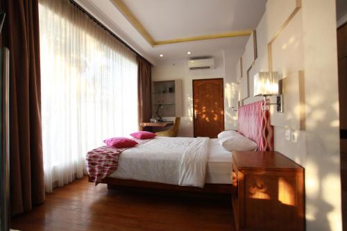 Una cama o camas en una habitación de Ocean View Residence