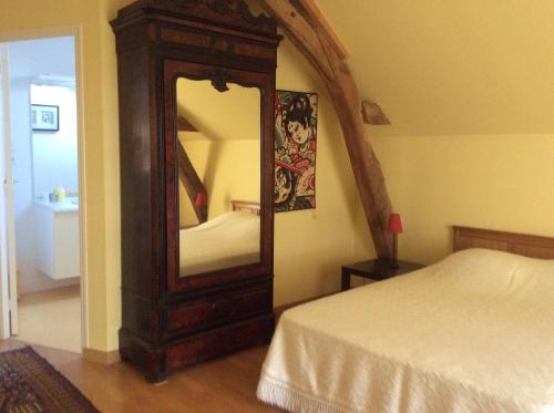 Cama o camas de una habitación en Domaine de la Houzardiere