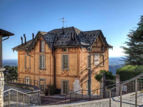 an old house on the side of a mountain at Bellavista Boutique Hotel in Brunate