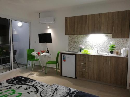 a kitchen with a sink and a counter top at Chicos Studios in Ayia Napa