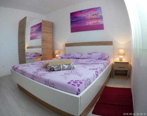 En eller flere senge i et værelse på Apartment Dolores