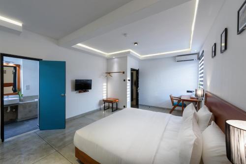 Cama o camas de una habitación en Fern Colombo