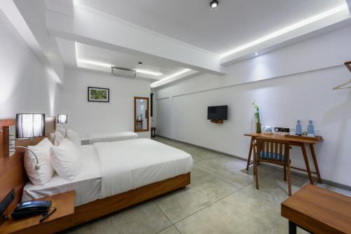 Cama o camas de una habitación en Fern Colombo