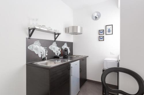 Kuchyň nebo kuchyňský kout v ubytování Minerva Residence