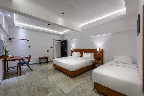 Cama o camas de una habitación en Fern Colombo