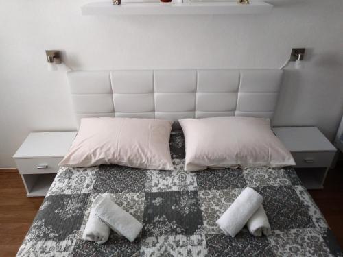 Un pat sau paturi într-o cameră la Apartment Doris