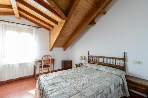 Cama o camas de una habitación en Hostal Camino Real