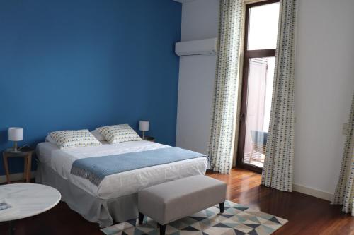 A bed or beds in a room at OHH - Porto Boutique Guest House