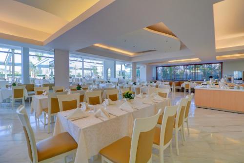 Restaurant ou autre lieu de restauration dans l'établissement Palace Hotel Glyfada