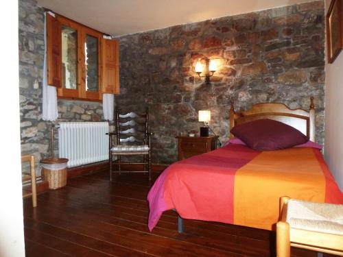 A bed or beds in a room at Can Mahola