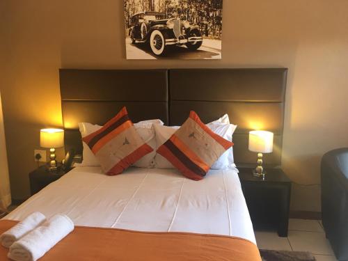 Postel nebo postele na pokoji v ubytování Vahlavi Lodge