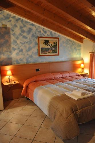 เตียงในห้องที่ Borgo Piccolo