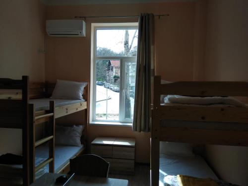 Ένα ή περισσότερα κρεβάτια σε δωμάτιο στο Hostel Ginger House