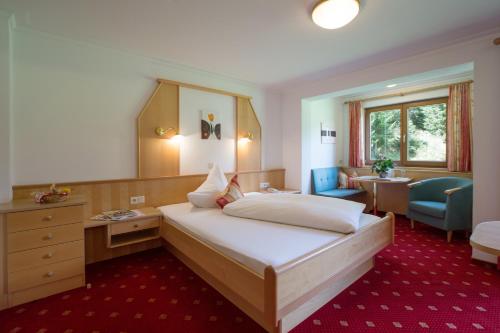 Ένα ή περισσότερα κρεβάτια σε δωμάτιο στο Haus Markus