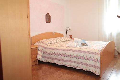 Ένα ή περισσότερα κρεβάτια σε δωμάτιο στο Albergo diffuso Valcellina e Val Vajont in Claut