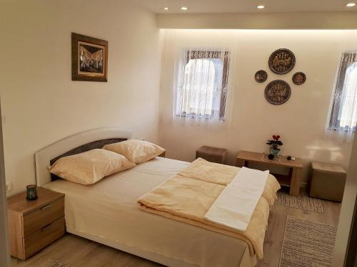 Llit o llits en una habitació de Frida Apartment
