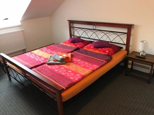 Ένα ή περισσότερα κρεβάτια σε δωμάτιο στο Penzion u Antonicka