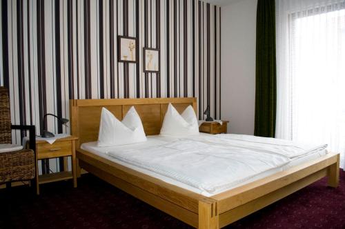 Cama o camas de una habitación en Hotel Cafe Bothe