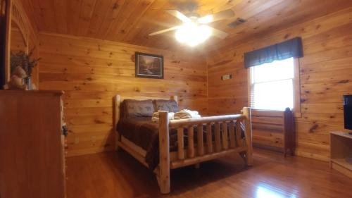 Katil atau katil-katil dalam bilik di Bearadise Lodge